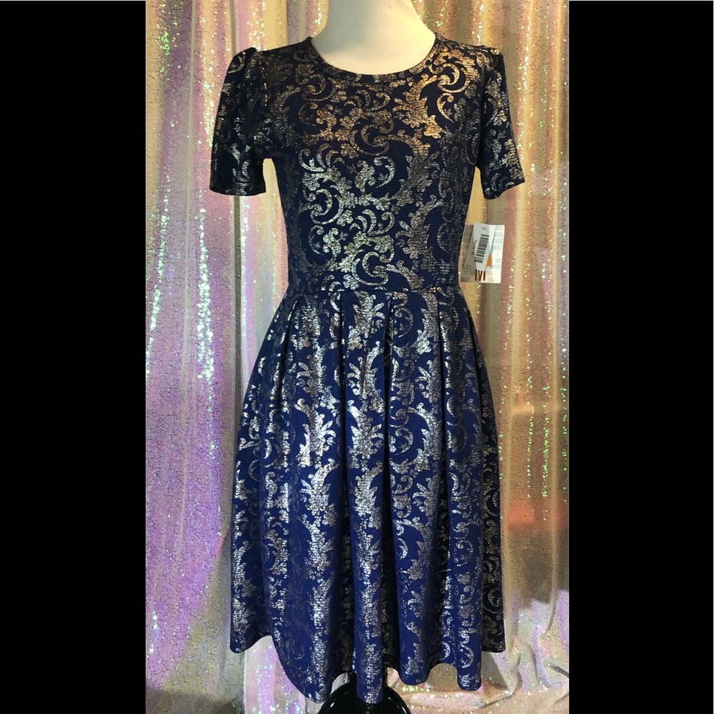 Elegant blue and silver box pleated dress with pockets.